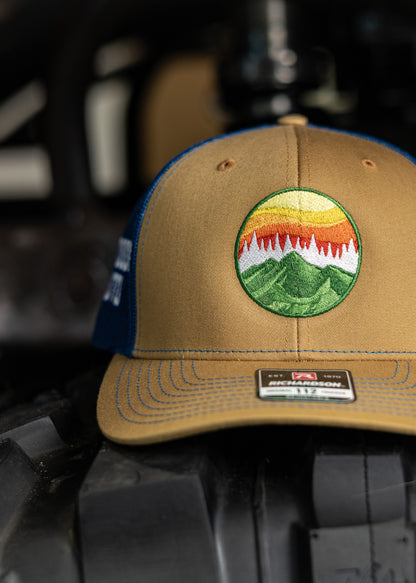 Biscuit and True Blue Logo Trucker Hat