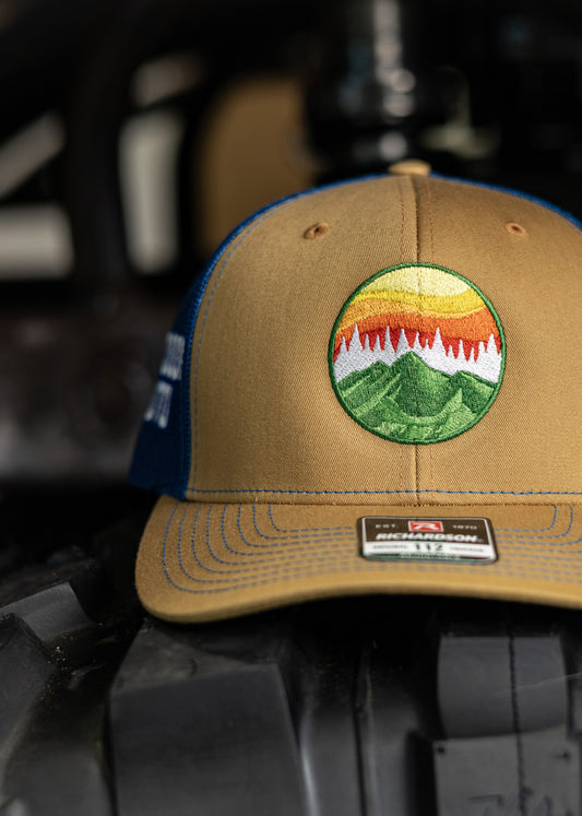 Biscuit and True Blue Logo Trucker Hat